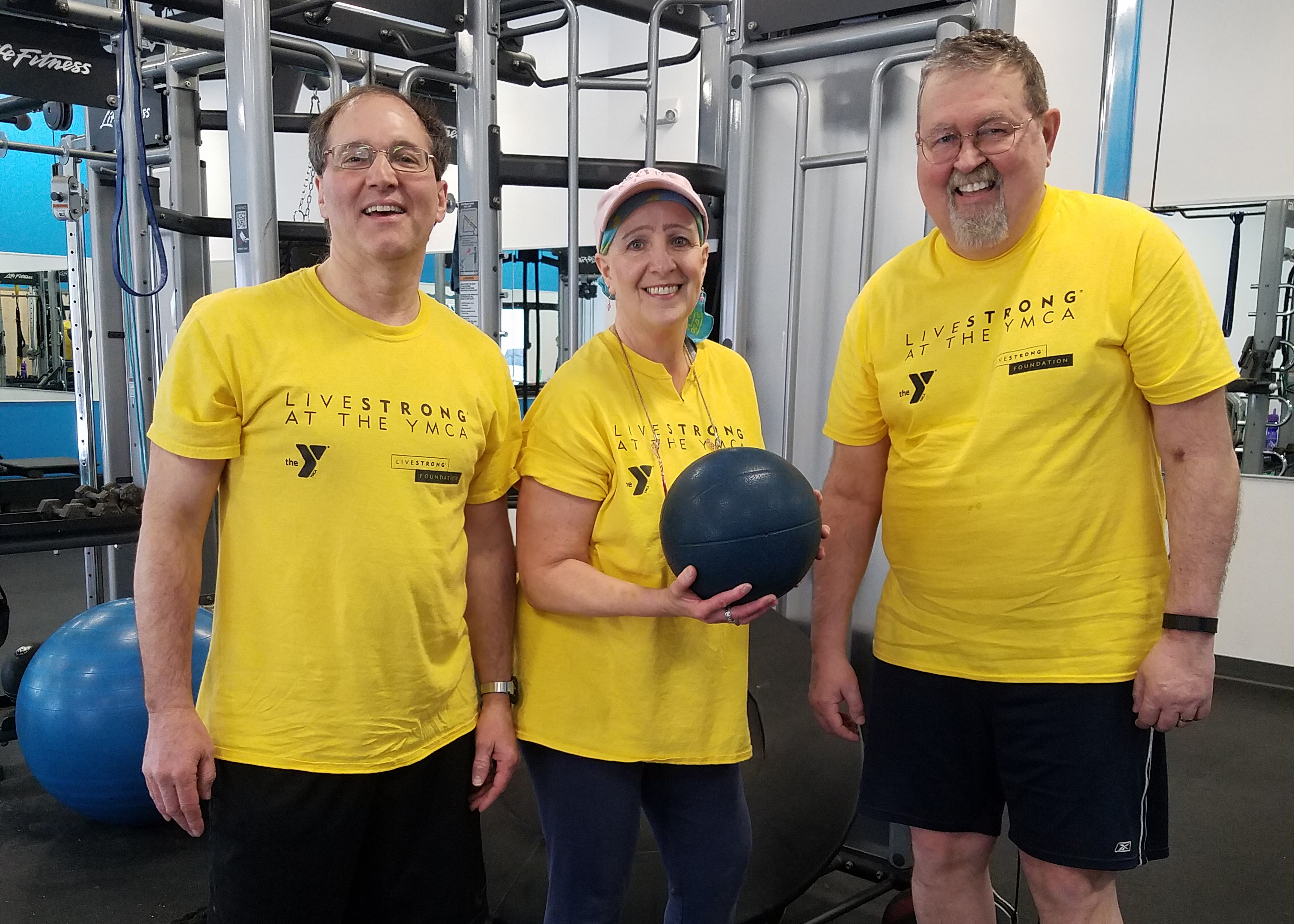 A group of people in yellow t-shirts at the LIVESTRONG event in Central Massachusetts.